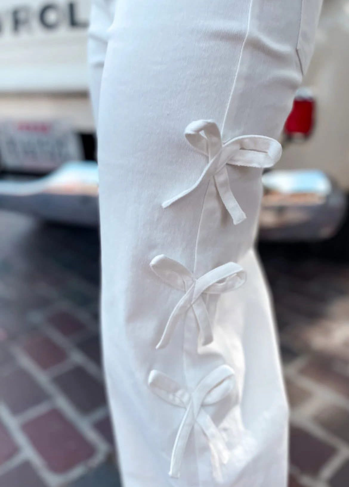 Bow knot side detail straight leg loose jeans